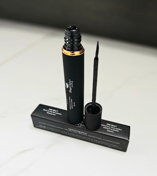 ONE BLISS Black brush-on lash adhesive and eyeliner 