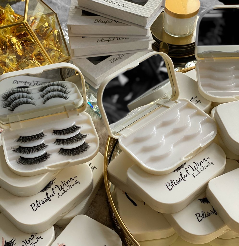 white lash storage cases, filled with lashes picture